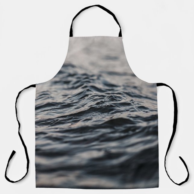 Wavy ocean during daytime apron (Front)