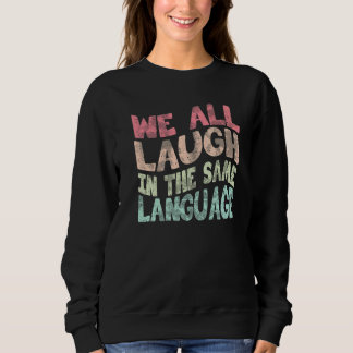 We all laugh in the same language tolerance and mi sweatshirt