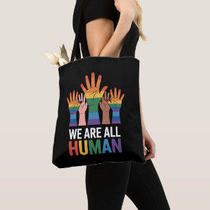 We Are All Human Rainbow LGBTQ Pride Raising Hands Tote Bag