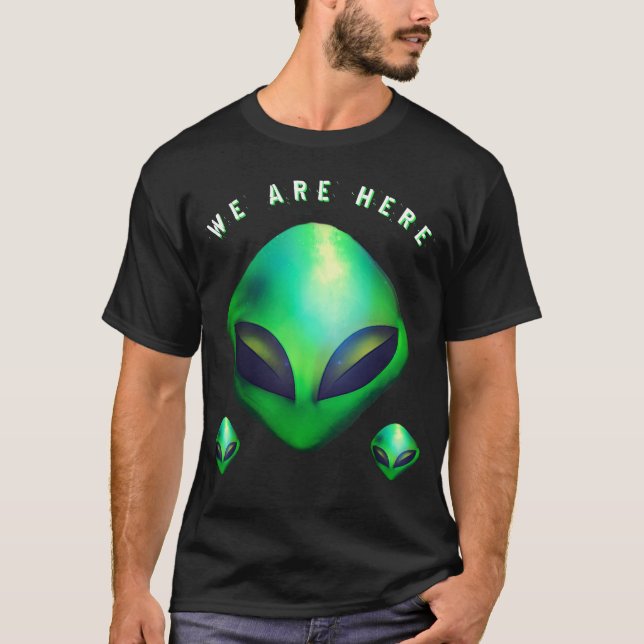 "We Are Here" Green Alien head T-Shirt (Front)