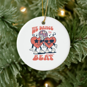we dance to the same beat ceramic ornament