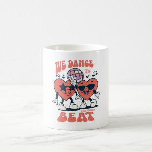we dance to the same beat coffee mug