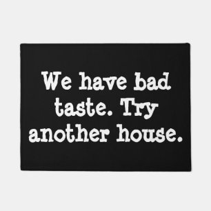 We have bad taste.  Try another house. Doormat