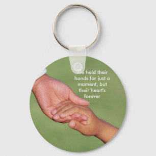 We hold their hands for just a moment, ... key ring