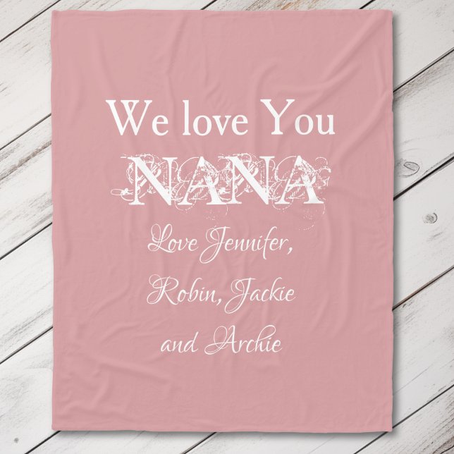'We Love You Nana' Elegant Script Names Soft Pink Fleece Blanket ('We Love You Nana' Elegant Script Names Soft Pink Fleece Blanket.)