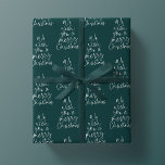 We wish you a merry Christmas dark green holiday Wrapping Paper<br><div class="desc">The very merry Christmas wrapping paper features a fun original type treatment that reads "We wish you a merry Christmas" in the shape of a Christmas tree. The white type on the rich dark green background make a fun and festive gift wrap design perfect for all your Christmas presents. Created...</div>