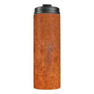 Weathered rusted metal: orange-red texture. thermal tumbler
