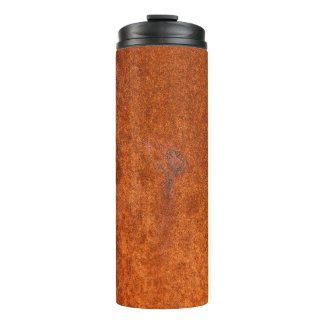 Weathered rusted metal: orange-red texture. thermal tumbler