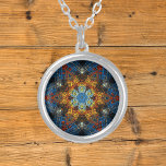 Weave Mandala Blue Yellow and Red Silver Plated Necklace<br><div class="desc">This funky mandala features blue,  yellow,  and red in a basket weave style. Psychedelic visuals for the modern hippie or anyone who loves groovy colours.</div>