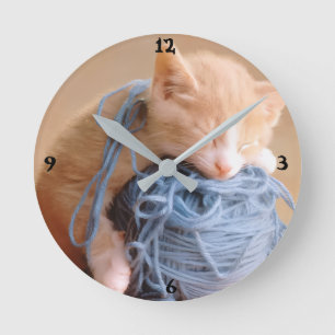 ""Weaving Dreams, One Stitch at a Time" Round Clock