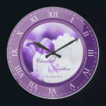 Wedding Anniversary Purple Amethyst Roman Numerals Large Clock<br><div class="desc">A lovely clock in purple amethyst tones, with Roman numerals. The frame that functions as part of the clock is also a frame for your favourite wedding photograph. Keep the sample image of purple and white crocuses, or replace it with your own image for full personalisation. Add your names and...</div>