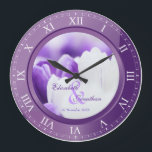 Wedding Anniversary Purple Amethyst Roman Numerals Large Clock<br><div class="desc">A lovely clock in purple amethyst tones, with Roman numerals. The frame that functions as part of the clock is also a frame for your favourite wedding photograph. Keep the sample image of purple and white crocuses, or replace it with your own image for full personalisation. Add your names and...</div>