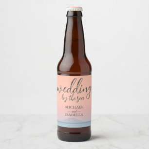 Wedding by the sea under peachy sky sunset beer bottle label