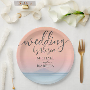 Wedding by the sea under peachy sky sunset paper plate