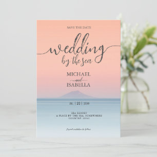 Wedding by the sea under peachy sky sunset save the date