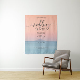 Wedding by the sea under peachy sky sunset tapestry
