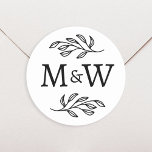Wedding Couple Monogram Elegant Botanical Classic Round Sticker<br><div class="desc">Add a touch of class to your wedding with this unique personalised couple monogram initial botanical leaves design.  Modern,  minimalist and simple serif font for a sophisticated look. Ideal for your invitation stationery and favour boxes.  Original art by Nic Squirrell.</div>