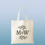 Wedding Couple Monogram Elegant Botanical Tote Bag<br><div class="desc">Add a touch of class to your wedding with this unique personalised couple monogram initial botanical leaves design.  Modern,  minimalist and simple serif font for a sophisticated look. Ideal for adding a unique touch for your guests to your wedding welcome bags and favours.  Original art by Nic Squirrell.</div>