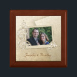 Wedding Photo Keepsake Box<br><div class="desc">Elegant wooden box, with graphic tile lid. Lovely graphics of a tan coloured damask, with a rectangular photo area, decorated with swirls. Custom text, at the bottom, is ready to personalise to read anything you want. Add your own wedding photograph and text to make this a special keepsake from your...</div>