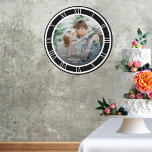 Wedding Photo White Roman Numeral Black BKG Round Large Clock<br><div class="desc">A wonderful clock gift with Love is Forever font, the couple's names, and the wedding date. Personalise this with your photo and information. Clock design of the white Roman numeral clock face with a pattern for a round clock design. The black background can be changed to another colour when you...</div>