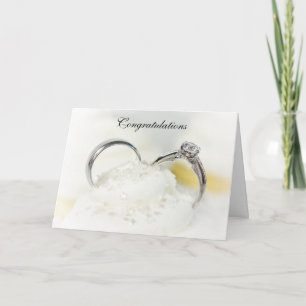 Wedding rings in frosting card