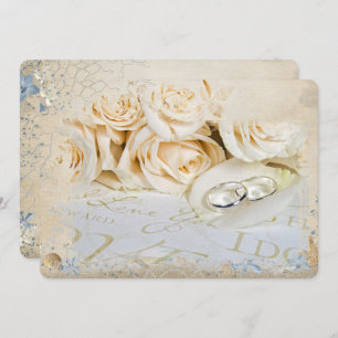 wedding rings on rose petal invitation