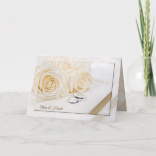 Wedding roses and rings on white Bible Card
