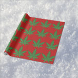 Weed Leaf Christmas Wrapping Paper<br><div class="desc">Weed Leaf Christmas Paper with the green weed leaf on red background makes your gift stand out with all the cool people on your Christmas list. Some may think it naughty but Santa thinks it's nice. What do you think is in his pipe?</div>