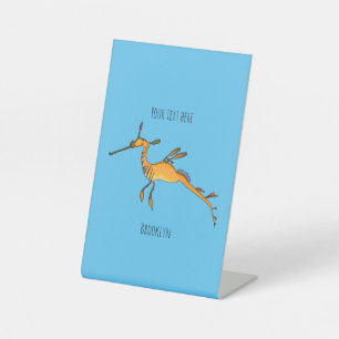 Weedy seadragon cartoon illustration pedestal sign
