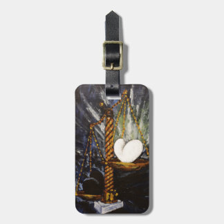 Weight of a heavy and light heart luggage tag