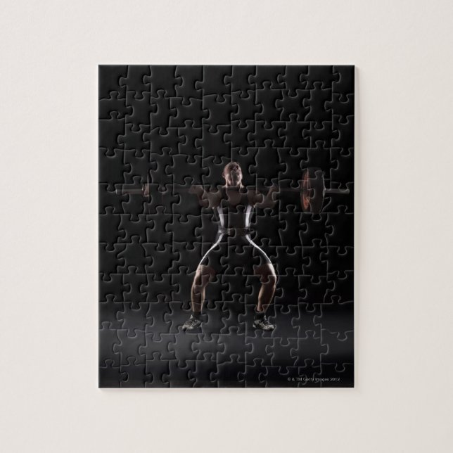Weightlifter jerking weight jigsaw puzzle (Vertical)