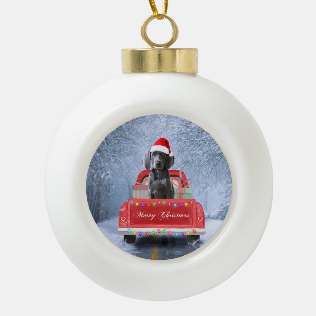 Weimaraner Dog in Snow sitting in Christmas Truck  Ceramic Ball Christmas Ornament (Front)