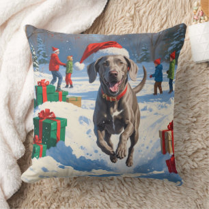 Weimaraner Running in Snow with Christmas Hat Cushion