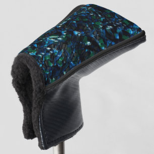 Weird mosaic over dark background and hazy sparkle golf head cover
