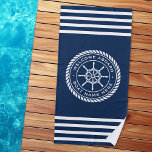 Welcome aboard boat name rope nautical ship wheel beach towel<br><div class="desc">Beach towel featuring a white,  elegant ship's wheel and rope emblem with custom text "welcome aboard" and boat name on a dark blue background. At the top and bottom of the towel are white stripes.</div>