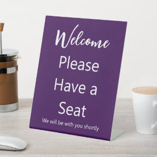 Welcome Please Have a Seat Purple and White Text Pedestal Sign