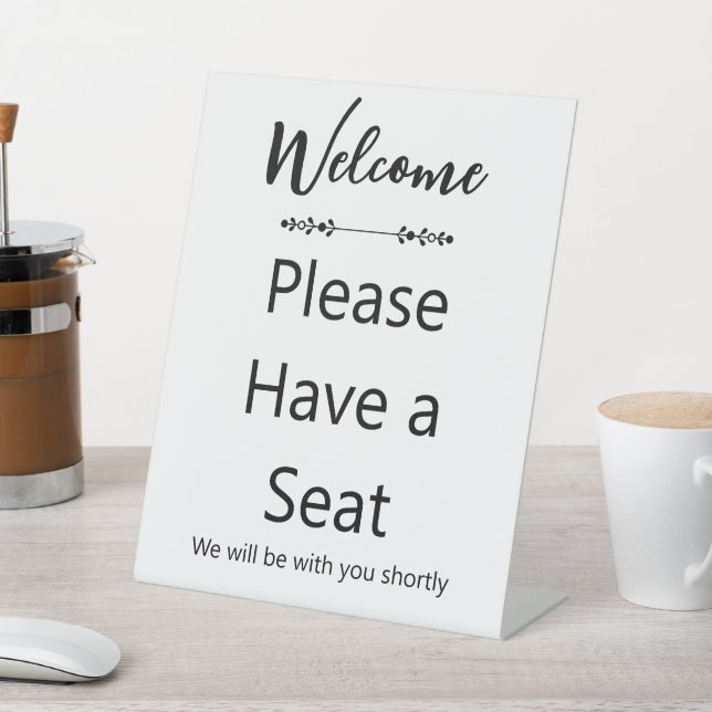 Welcome Please Have a Seat White and Black Pedestal Sign (In SItu)