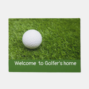 Welcome to golfer's home with golf ball on green doormat