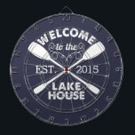 Welcome to the Lake House | Rustic Canoe Paddles Dartboard<br><div class="desc">Spend your leisurely lakeside hours playing darts with this fun,  unique dartboard. Design features a midnight blue background with "Welcome to the Lake House" in rustic block text and two crossed canoe paddles. Customise with the year established for an awesome housewarming present or gift for your weekend hosts!</div>