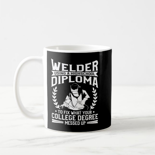 Welder Using A High School Diploma To Fix Welding Coffee Mug (Left)