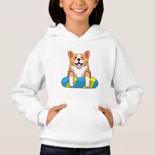 Welsh Corgi at Swimming with Swimming board