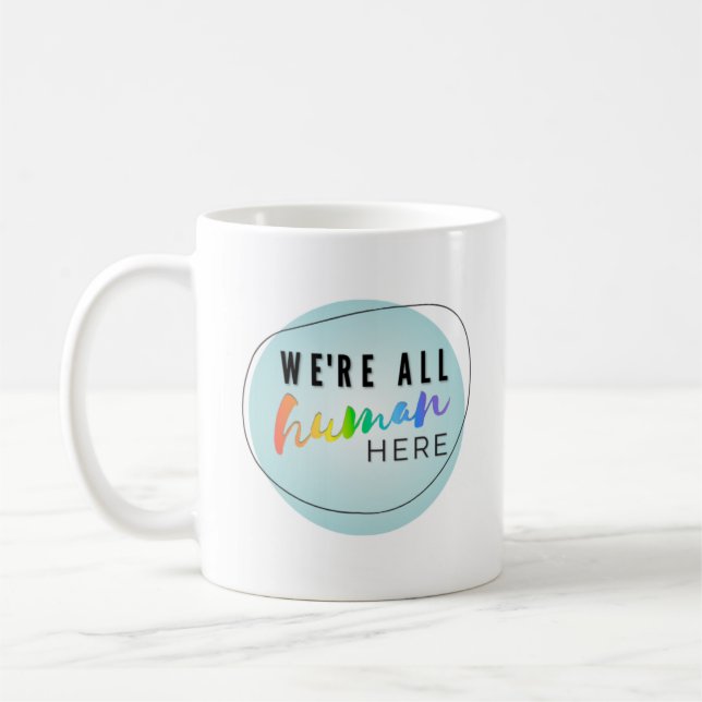 We're All Human Here rainbow logo Coffee Mug (Left)