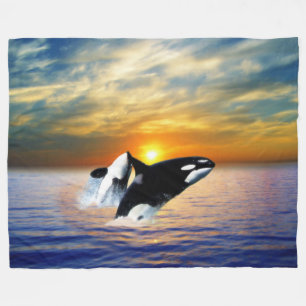 Whales at sunset fleece blanket
