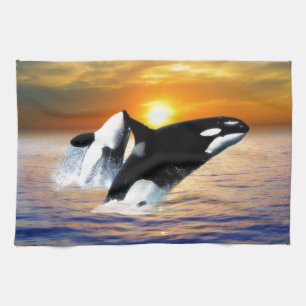 Whales at sunset tea towel