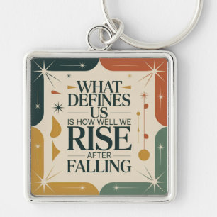 What Defines Us Is How Well We Rise After Falling Key Ring