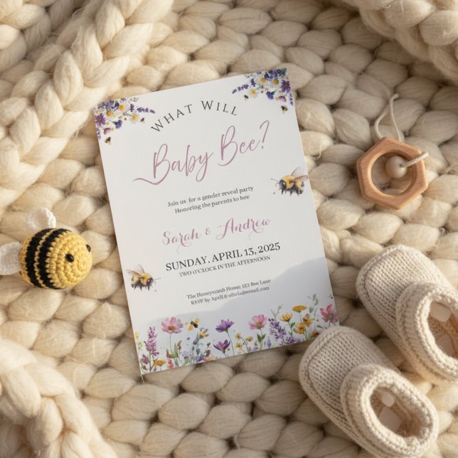 What Will Baby Bee Gender Reveal Party  Invitation (Gender reveal invitation on chunky knit blanket with baby booties and bee toy in warm light)