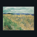 Wheatfield with Cornflowers | Vincent van Gogh Postcard<br><div class="desc">Wheatfield With Cornflowers (1890) by Vincent van Gogh (Dutch, 1853–1890) is a vivid and emotionally charged landscape from the artist’s final year. In this painting, Van Gogh captures a golden wheatfield punctuated with brilliant blue cornflowers, using his signature bold brushwork and dynamic colour contrasts. The composition conveys both the beauty...</div>