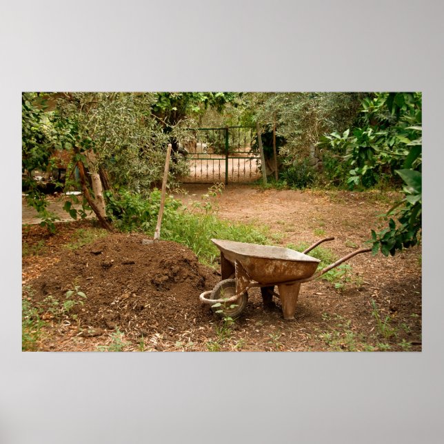 Wheel Barrow Next To Soil Heap Poster (Front)