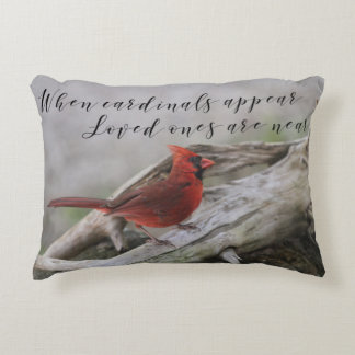 When cardinals appear, loved ones are near decorative cushion