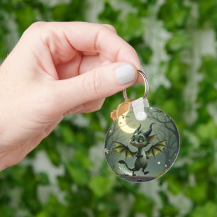 Where moonbeams dance, little mischief awakens. key ring